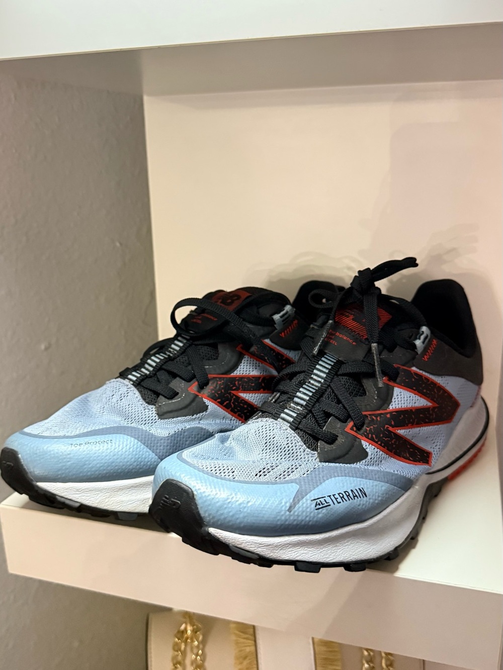 New Balance Men's Light Blue Black Red All-Terrain Athletic Shoes